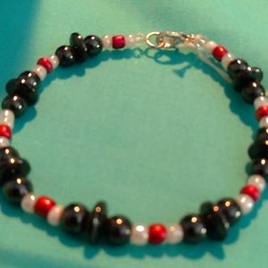 Oggie design glass beaded bracelet